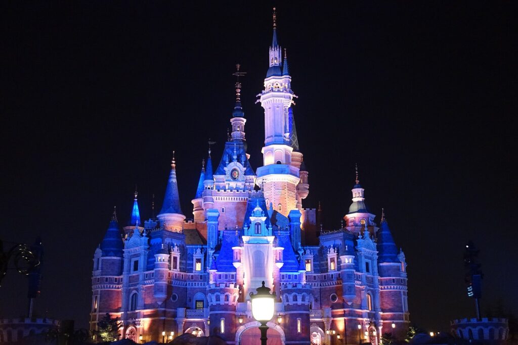 Enchanted Storybook Castle lit up at night at Shanghai Disneyland