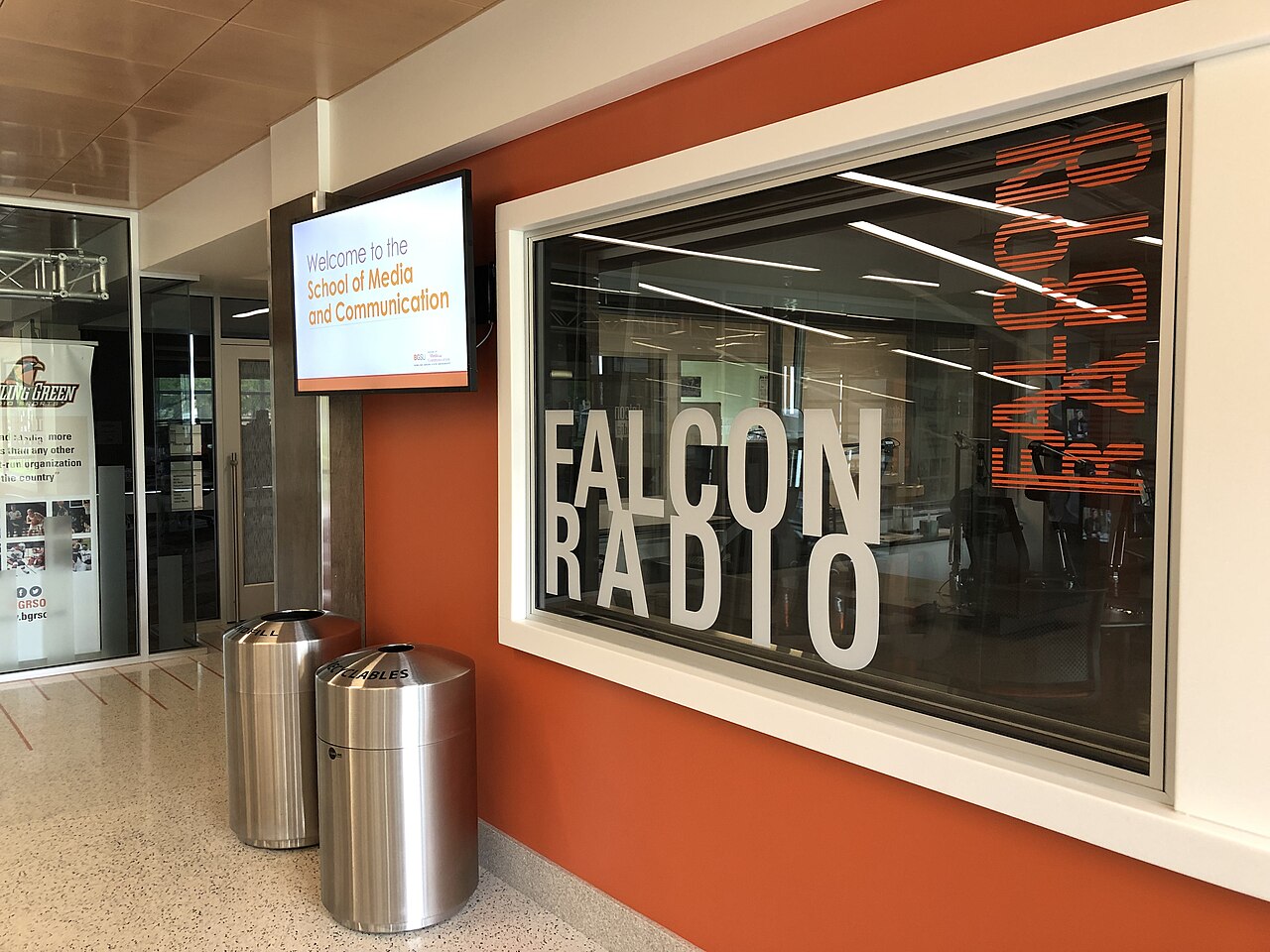 The Falcon Radio WFAL student radio studio seen through its glass window